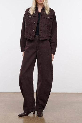 Dark brown denim jacket with button front and two chest flap pockets