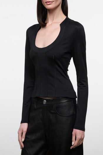 Black fitted long-sleeve top with deep V-neck and center seam