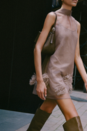 <p>New dresses play with Calluna signature details, from high necklines and bow details to tiered hems.</p>