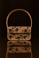 <p>The Tommy Bag receives seasonal updates to coordinate with each STAUD collection.</p>
