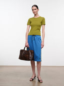 Blue midi skirt with drawstring tie waist and logo patch hem