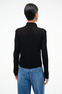 Black knit turtleneck sweater, buttoned back view, long sleeves