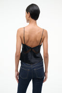 Back view of black silk camisole with spaghetti straps and crisscross bow detail