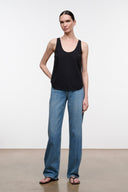 High-rise blue denim jeans with wide straight leg and button front.