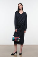 Charcoal V-neck sweater dress with long sleeves and tied waist, midi length