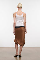 Silk midi skirt in dark brown with black elastic waistband and drawstring ties