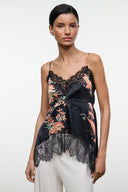 Noir silk camisole top with floral print, scalloped lace trim, adjustable spaghetti straps