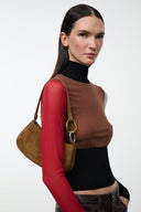 Cigar suede hobo bag worn on shoulder, gold ring hardware and open top