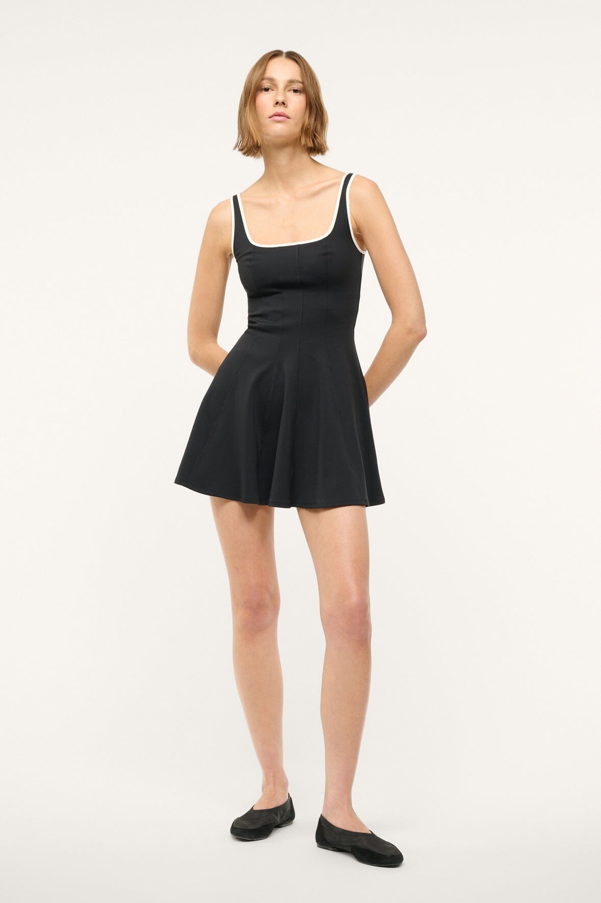 Image WELLS MINI SPORT DRESS | BLACK IVORY 1 of 6 and Clicking this image will trigger a zoom pop-up