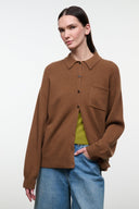 Cigar brown cashmere cardigan with button front, pointed collar, and chest pocket detail