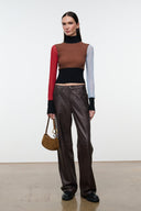 Cigar suede hobo bag on shoulder with gold ring pull and textured suede exterior