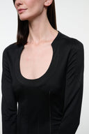 Black long-sleeve scoop-neck top with curved hem and fitted seams