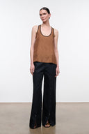 Black wide-leg pants with front pockets and long drape