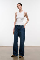 Relaxed dark-wash jeans with wide-leg cut and front patch pockets, belt loops