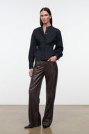 Black stand-collar button top with long sleeves and layered peplum hem