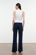 Women's dark navy striped wide-leg jeans, back view with pull-on waistband and wide straight legs