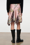 Mid-length silk skirt in dusty pink with multicolor floral print and ruffled hem