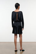 Black silk mini dress with long sleeves, ruched back detail