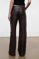 Dark brown leather pants with straight-to-wide legs, front pockets, and belt loops.