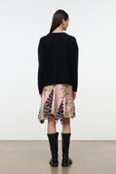 Silk skirt with botanical tapestry print on dusty pink, mid-length and ruffled hem