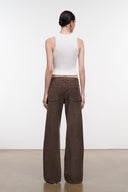 Relaxed dark brown corduroy jeans, wide leg, back view with two patch pockets