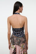 MAEVA silk halter top with navy multicolor print and tiered fringe hem (back view)