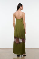 DELFINA silk dress in olive green with spaghetti straps and lace hem detail at back