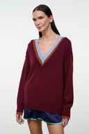 Burgundy V-neck sweater with light blue and brown striped trim, relaxed fit, long sleeves