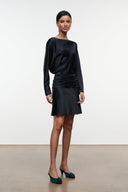 Black silk mini dress with long sleeves and gathered ruched waist, front view