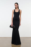 Black sleeveless maxi dress with scoop neck, thin straps, fitted bodice and fluted hem