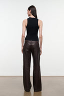 Dark brown leather pants in back view, wide legs and belt loops.