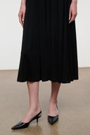 Black snake-texture slingback pumps with pointed toe and slim stiletto heel