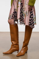 Cashew brown tall leather pull-on boots with pointed toe