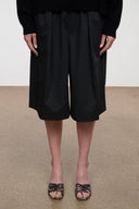Black quill-look mule sandals with crisscross straps and high heel
