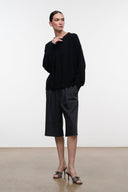 Quill mules with black textured straps and slim stiletto heel