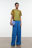 Faded moss green crewneck short-sleeve tee shirt, angled front view