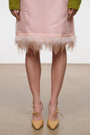 Cashew heeled pumps, lace-up ankle ties with small bow, on model