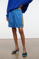 Haskell blue shorts with yellow trim side stripe, front elastic waist, small logo.