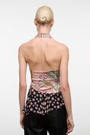 Pink silk halter top with open back, multi-color print, ruffled peplum hem