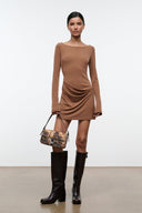 Tall dark leather boots with low block heel and side pull tab