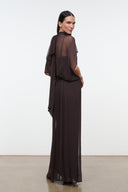 Dark brown maxi dress with high neck, draped sleeves, and gathered waistline
