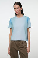 Light blue crewneck short-sleeve tee, front view, relaxed fit