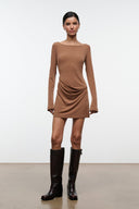 Tall dark leather boots with low block heel and side pull-on opening