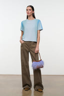 Light blue crewneck short-sleeve tee, front view, relaxed fit, slight side angle