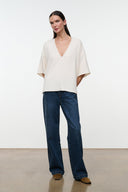 Ivory V-neck tee with short sleeves, loose boxy silhouette