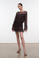 Earth-toned mini dress with sheer sleeves, drawstring cuffs, ruched waist and straight hem