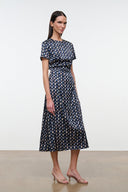 Silk midi dress, navy blue multicolor print, short sleeves, belted waist, side view