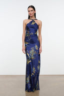 Dark blue silk halter maxi dress with gold botanical print and tied neck