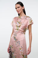 Pink floral printed dress with flutter cap sleeves and round neckline.