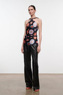 Silk halter top with black base and multicolor circular print, gathered waist